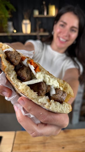Snezana Calic on Instagram: "Ćevapi are deeply traditional from the region I come from. They’re the kind of food you eat standing up, straight off the grill, wrapped in bread, with onion on your fingers and smoke in your hair. Everyone has their own version, and everyone swears theirs is the right one. This recipe comes from my friends in Bosnia. When it comes to meat, you can really use any mix you like, but fat is essential — cevapi need it. If you go too lean, they’ll be dry. Ingredients (for