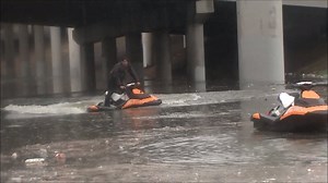 JET SKI RESCUES: Alan Parker is using his jet skis to help rescue people who were stranded in high water areas along U.S. Highway 59 near downtown Houston. Coco Dominguez Fox 26 wasn't sure what to make of it when she saw him on Houston TranStar, but then reporter Natasha Geigel spoke with him and learned about his helpful motive. | FOX 26 Houston