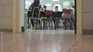 Students working at their desks in a classroom