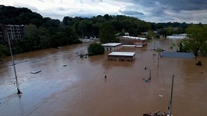 Drone footage of Asheville flooding shows swallowed city streets