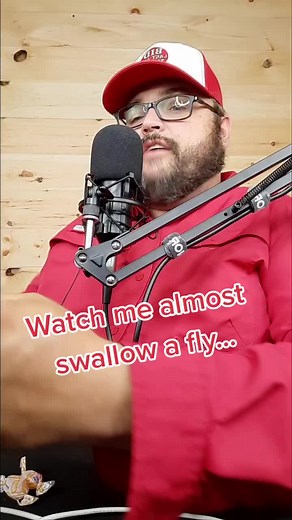 Funny Auctioneer Almost Swallows a Fly