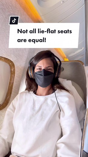 The difference between true lie-flat seats versus angled lie-flat seats in some business and first class cabins on planes! #businessclass #firstclass #lieflatseats #flyingtips #traveltips #luxurytravel #planetok #laxtoluxury #emirates Flights, planes, business class travel, first class travel, lie flat seats