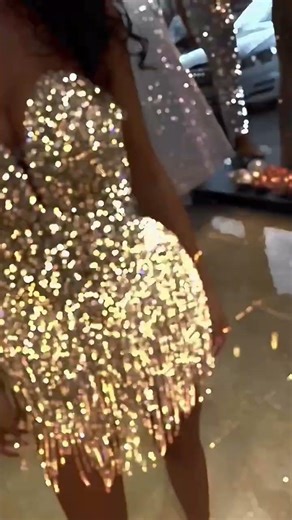 To order this champagne crystal fringe dress DM A dazzling strapless mini dress featuring a