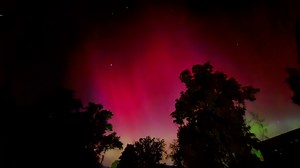 Timelapse video and photos show colorful scenes as northern lights illuminate the night skies across the country. | USA TODAY Video