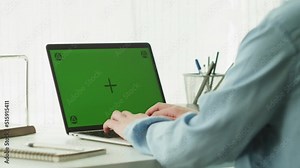 Information technology, IT business. Laptop with chroma key screen. Programmer developing new application. Digital software, mobile app development. Man specialist coding on computer. Web design.