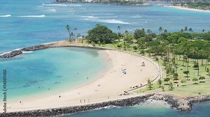 Expensive apartments in the skyscrapers with scenic Pacific ocean beach view on Hawaii island, USA. 4K aerial overview of Honolulu Downtown. Modern frontline business and residential buildings on Oahu Stock Video