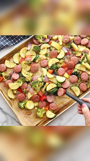 This Keto Sheet Pan Sausage and Veggies is sure to be a family favorite. With tasty smoked sausage and tender roasted vegetables, this one-pan meal is easy to make and delicious. Recipe>> https://kaseytrenum.com/keto-sheet-pan-sausage-veggies-quick-low-carb/ | Easy Keto/Low Carb Recipes