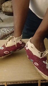 Going through my stuff. I found these!! My very first Fully Beaded Moccasins I did. I love how all the beads are still intact. Maroon with some pink and green n white. Women size 8.5 My husband going to re do the Soles and they will be up for Sale! Stay turn | Sue Ann Merrick-Sullivan