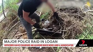 The president of a major bikie gang and six of his associates have been charged after raids uncovered allegedly stolen guns and drugs at a Chambers Flat home. Michael De-La-Warr was granted bail. 7NEWS at 6pm. More local news: 7news.com.au/news/qld #7NEWS | 7NEWS Brisbane