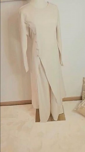 Ensemble ivoire élégant haut fluide et pantalon femme