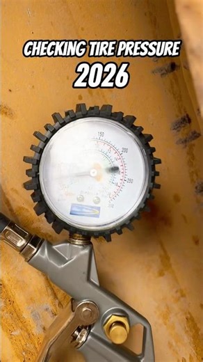 Which one do you use? Checking dump truck tire pressure #heavyequipment #mechanic