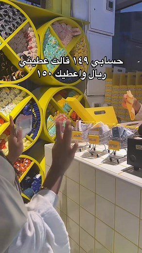 Shopkeeper Counting Cash in Bright Retail Environment