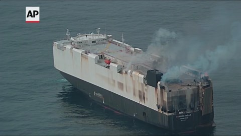 Salvage crew bound for the site of a cargo ship fire off the coast of Alaska