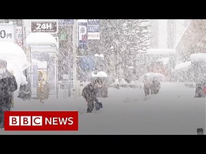 Snow storms bring deadly chaos to Japan - BBC News