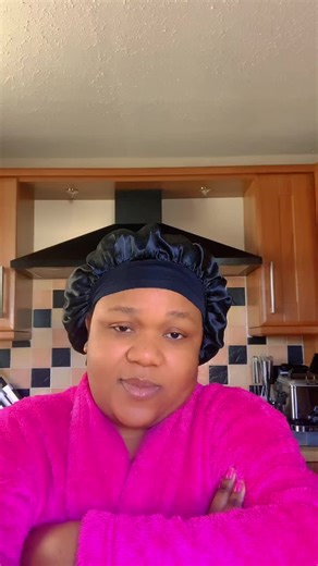 Stylish Home Kitchen Setup with a Pink Robe