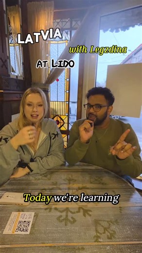 Life in Latvia by Gokul M S on Instagram: "Learning Latvian with Legzdina at Lido, Let’s gooo 😤🍽️ @legzdina and I went through a bunch of Latvian words, some I actually knew (I'm not that bad 💅🏽), and some were fully alien to me (ehehehehehe😭). Make sure to tune into @lsmsupernova on LTV at 9/10PM on 14.02.2026 AND YES, its Valentine’s Day, so spend it wisely 😌❤️ And don’t forget to VOTE for her!! 🗳️🔥 #supernova2026 #teamlegzdina #legzdivas #lsmsupernova #eurovision2026"