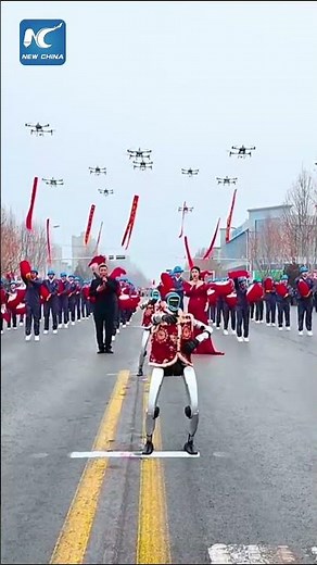 Humanoid robots perform Yangge dance in north China