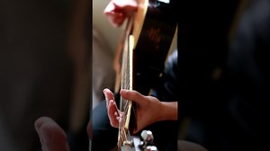 How to play a broken guitar.