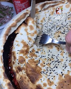 72K views · 502 reactions | A hearty Turkish stew packed with tender meat and vibrant veggies, all hidden beneath a perfectly baked bread crust topped with sesame seeds. A satisfying reveal for a truly unforgettable meal! 稜 #geekyfork | Taste Lab | Facebook