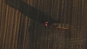 Tractor pulling hay bales - Free Stock Video