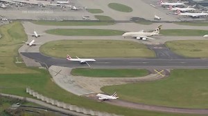 Aerials show flights resuming at Heathrow Airport after 18-hour shutdown