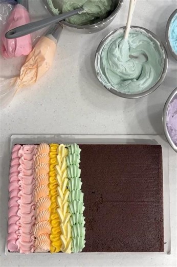 I frosted this sheet cake one row at a time to teach different border piping techniques! #piping