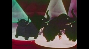 CIRCA 1948 - In this animated film, Tom Thumb watches elephants perform at a circus.