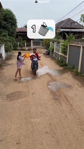 How Much Water Can Knock Down a Moving Bike? 💦🏍️ #shots #facts