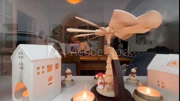 Mature adult tailor is sewing an año viejo doll, a Latin American Ecuadorian tradition representing the old year, in preparation for New Year's Eve celebrations in Amsterdam, Netherlands.