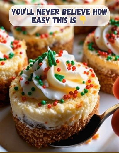 Mini Christmas Cheesecakes | Creamy, Festive & Perfectly Poppable 🎄🧁 These little cuties are the holiday treat everyone reaches for first! Buttery graham crust, smooth cheesecake filling, and a swirl of whipped topping with Christmas sprinkles… totally irresistible 😍 Ingredients: For the crust: 1 cup graham cracker crumbs 3 tbsp sugar 4 tbsp melted butter For the cheesecake filling: 16 oz cream cheese, softened ½ cup sugar 2 large eggs 1 tsp vanilla extract ¼ cup sour cream Topping: Whipped c