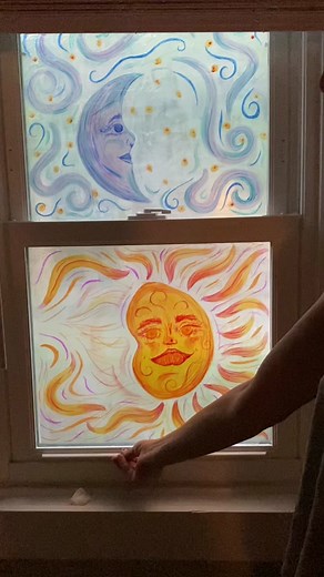 cozying our rental home on a rainy day #art #stainedglassart #elmersgluewindow #elmersglue #window #sunandmoon #painting #rain