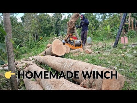 Pulling Huge Logs from a Steep Cliff Using a Homemade Winch