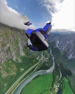 That view when they break through the clouds 😲☁⛰ Red Bull Skydive Team show us Norway in all its glory. 🪂- Marco Fürst, Marco Waltenspiel Max Manow | Red Bull Adventure