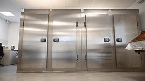 clip-1103635901-refrigerators-morgue-mortuary-corpses-storage