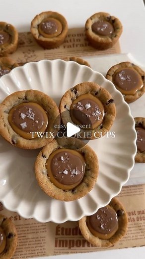 Hajar Larbah on Instagram: "Twix Cookie Cups! Super easy dessert but super cute too 🍪 Recipe 18 of 30 of the Ramadan Recipe Series - https://moribyan.com/twix-cookie-cups/ 🤎 🤍 DINNER ECOOKBOOK IS OUT NOW! 50 EXCLUSIVE BRAND NEW RECIPES - LINK IN BIO TO GET YOUR COPY 🤍 #ramadan #baking #dessert #recipe #iftar #food #foodie #foodblog #foodstagram #yummy #eeeeats #cooking #recipes #instafood #hack #instafood #chocolate #cookies"