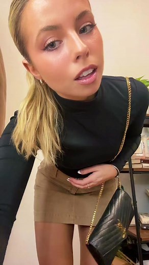 Stylish Rainy Day Outfit Inspiration with Low Rise Mini Skirt and Boots