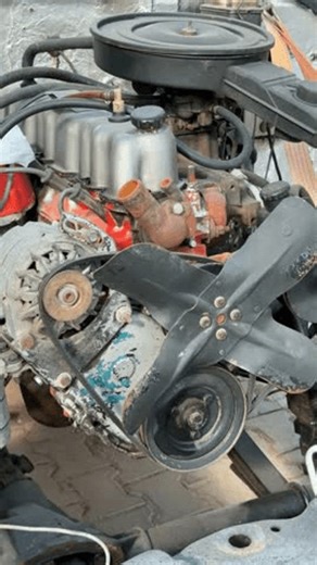 clip-3984804875-old-car-engine-rusty-condition-visible-fan