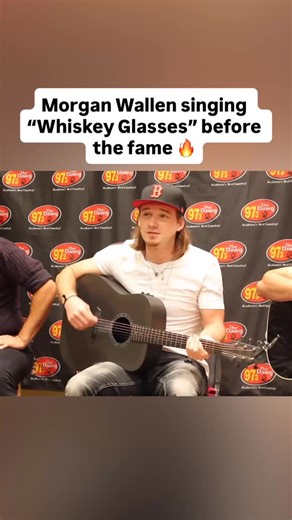 Country Music on Instagram: "Now he’s selling out stadium tours ❤️ Before the fame and sold-out arenas, Morgan Wallen performed “Whiskey Glasses” during an early radio appearance at 97.3 The Dawg, giving listeners a raw first look at what was coming. With just a mic and his unmistakable rasp, he leaned into the heartbreak of the song, delivering it with a grit that instantly set him apart. There was nothing flashy—just emotion, honesty, and a voice that cut straight through the room. Looking bac