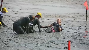 Video. Athletes get down and dirty in mud Olympics
