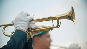 Military personal playing the trumpet - Free Stock Video