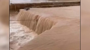 Video shows water gushing through port as 8 months worth of rain falls on Libya