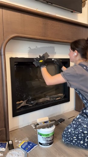 Rebecca Janis on Instagram: "Isn’t this tile gorgeous?! Finally finished the fireplace and I can’t wait to show you. Insert from @mantelsdirect + @modern.ember"