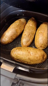 7.2K views · 52 reactions | Baked Potato Cooked in Over Half the Time! 1. Cut potato in half 2. Drizzle olive oil 3. Sprinkle salt 3. Cook cut side down in the Airfryer 400 for 16 minutes Happy Cooking! #potato #airfryer #cookinghacks | Chop Happy | Facebook