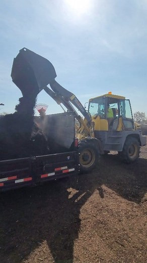 How many yards of mulch do you think are being loaded? #landscaping #mulch | Keith Kalfas
