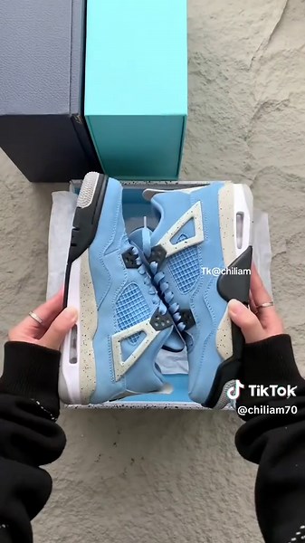 Jordan 4 Retro Sneakers in Sky Blue
