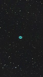 The Ring Nebula (M57), also known as M57 or NGC 6720, is a famous planetary nebula located in the constellation Lyra. It appears as a ring-shaped cloud of ionized gas surrounding a dying star. The nebula is about 2,300 light-years from Earth and spans approximately 1 light-year across. Its distinctive ring-like appearance is due to the orientation of the nebula, which is viewed nearly end-on from Earth, revealing the expanding shell of gas ejected by the central star. I made this capture with a 