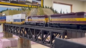This WC stack train, powered by two Walthers locomotives, is on the right track in this layout by @mn_modelrailroader. | Walthers Trains www.walthers.com