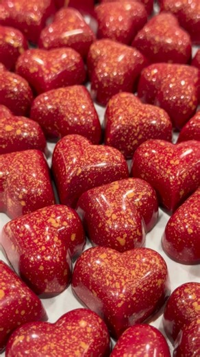 Obsessed with the colour palate of the Salted Caramel Hearts this year 😍 Each box features six uniquely coloured bonbons, filled with our signature salted caramel sauce and shelled in dark chocolate. This is a match made in heaven! We’re busy in the kitchen this week making lots more of all our Valentine’s items, including both bars, macarons, bonbons and more! We’re so glad you’re loving it all! 🥰 #filigreechocolaterie #yqrfood #yqr #saskmade #choccychatcrew | Filigree Chocolaterie