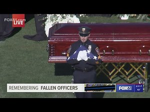 US Flag folding ceremony, flyover for fallen Bristol police officers