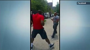 Video Shows Officer, Man Fighting on Harlem Street